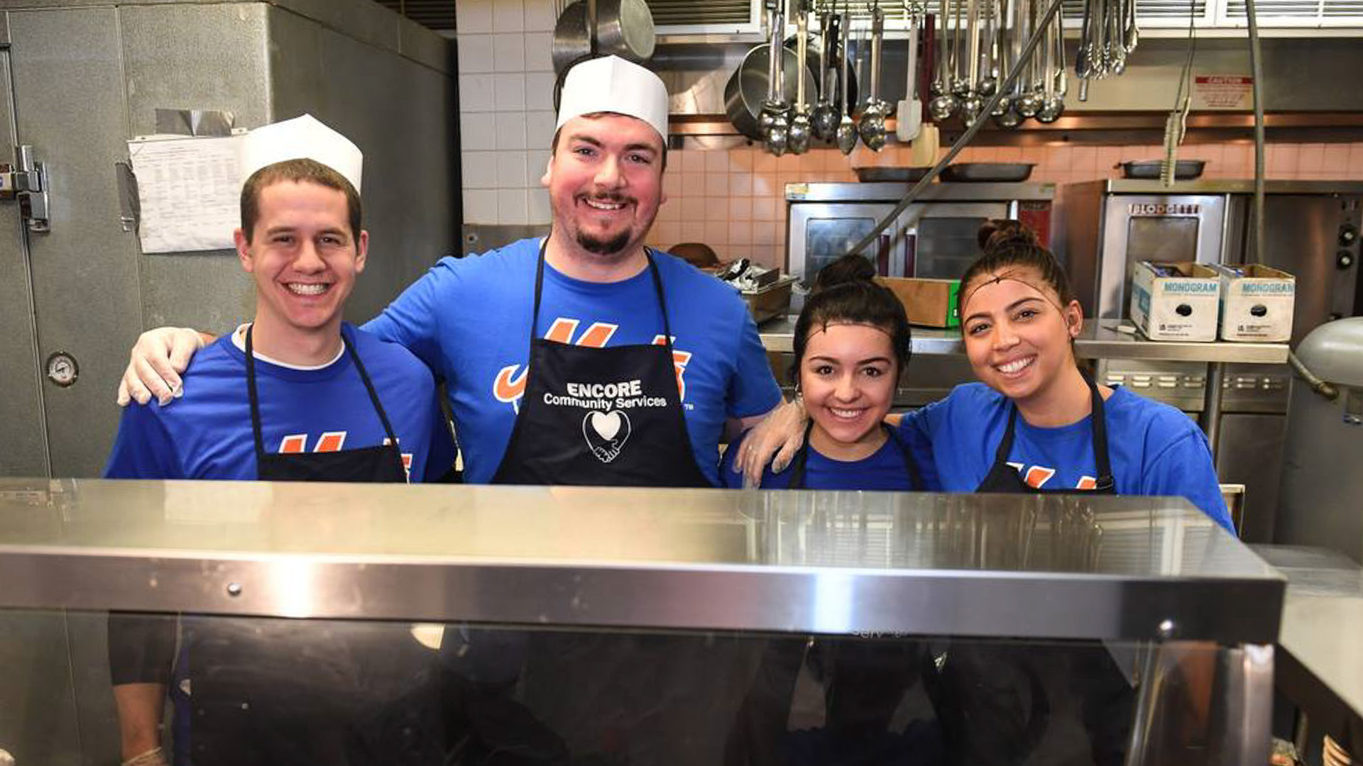 volunteers in a kitchen