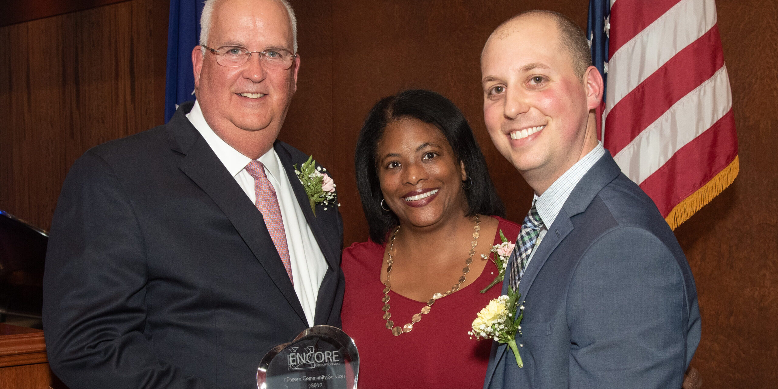 Encore board members accepting an award